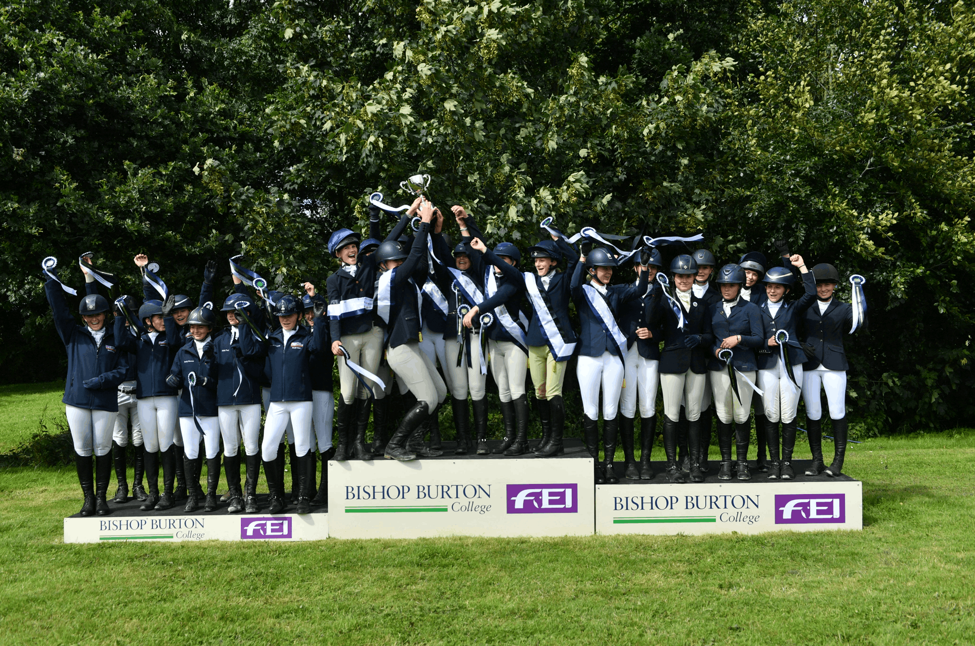 Students celebrating success at an equine event at Bishop Burton College