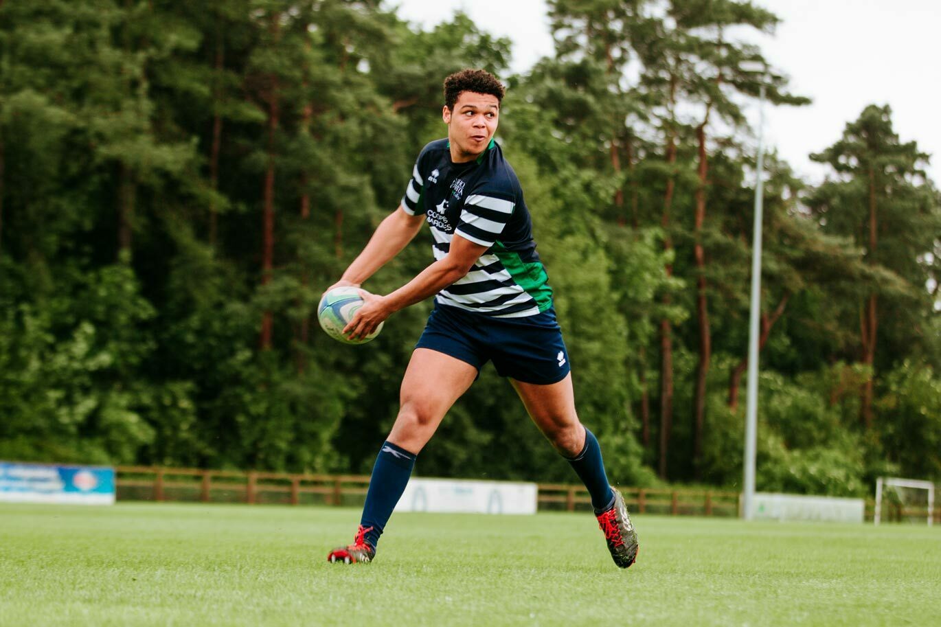 ACE rugby academy student playing on Bishop Burton College pitch