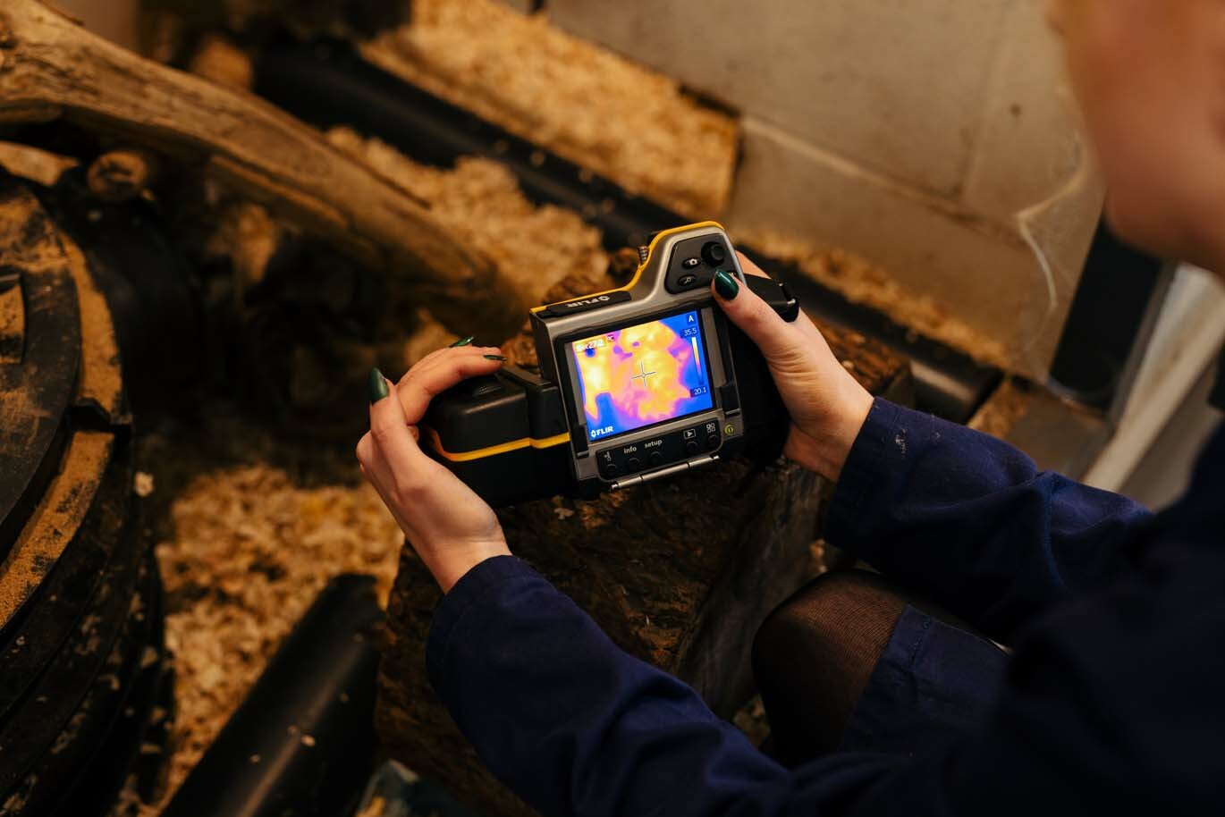 Animal Sci gallery Student uses thermal imaging camera on the animal unit