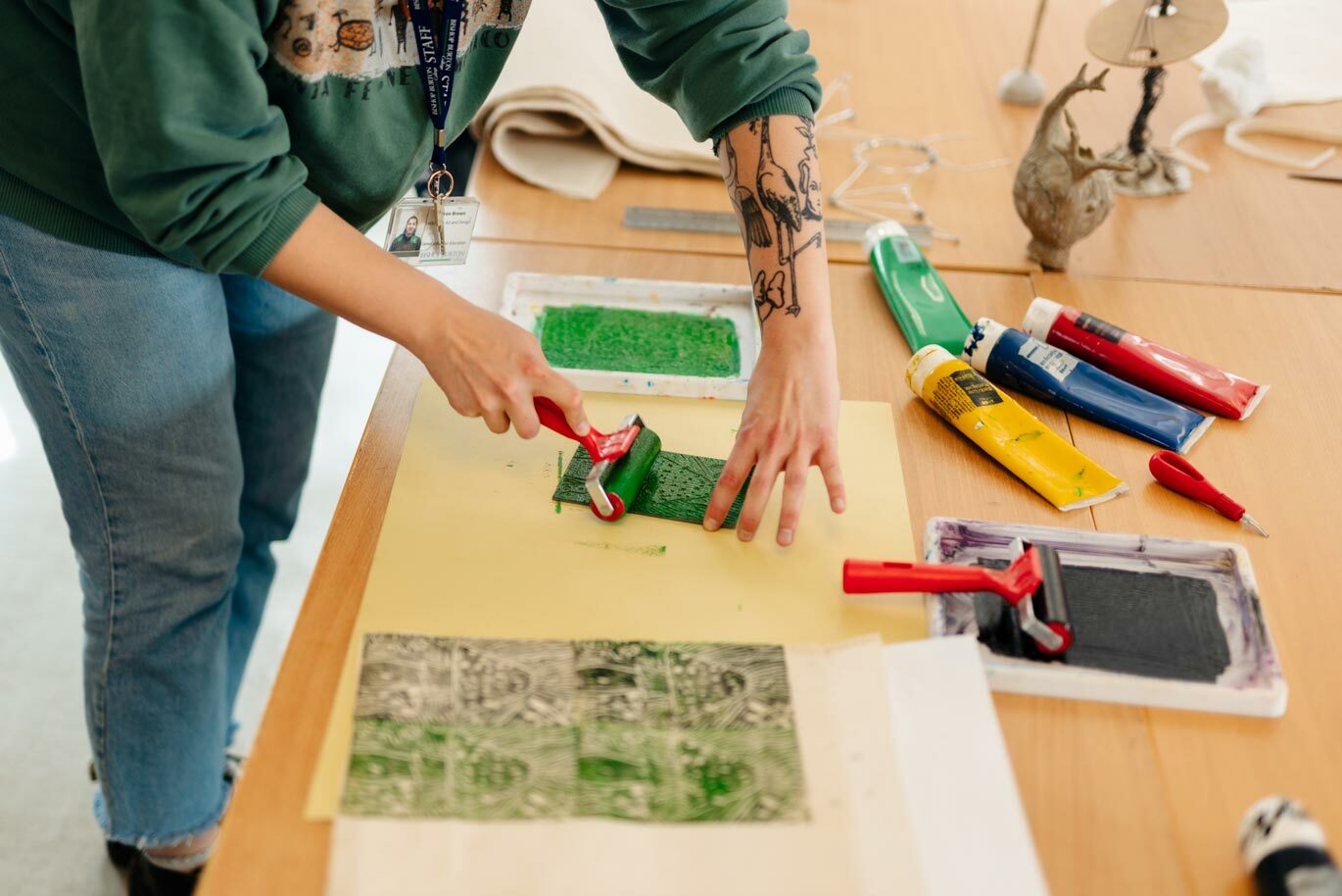 Art team creating linocut prints