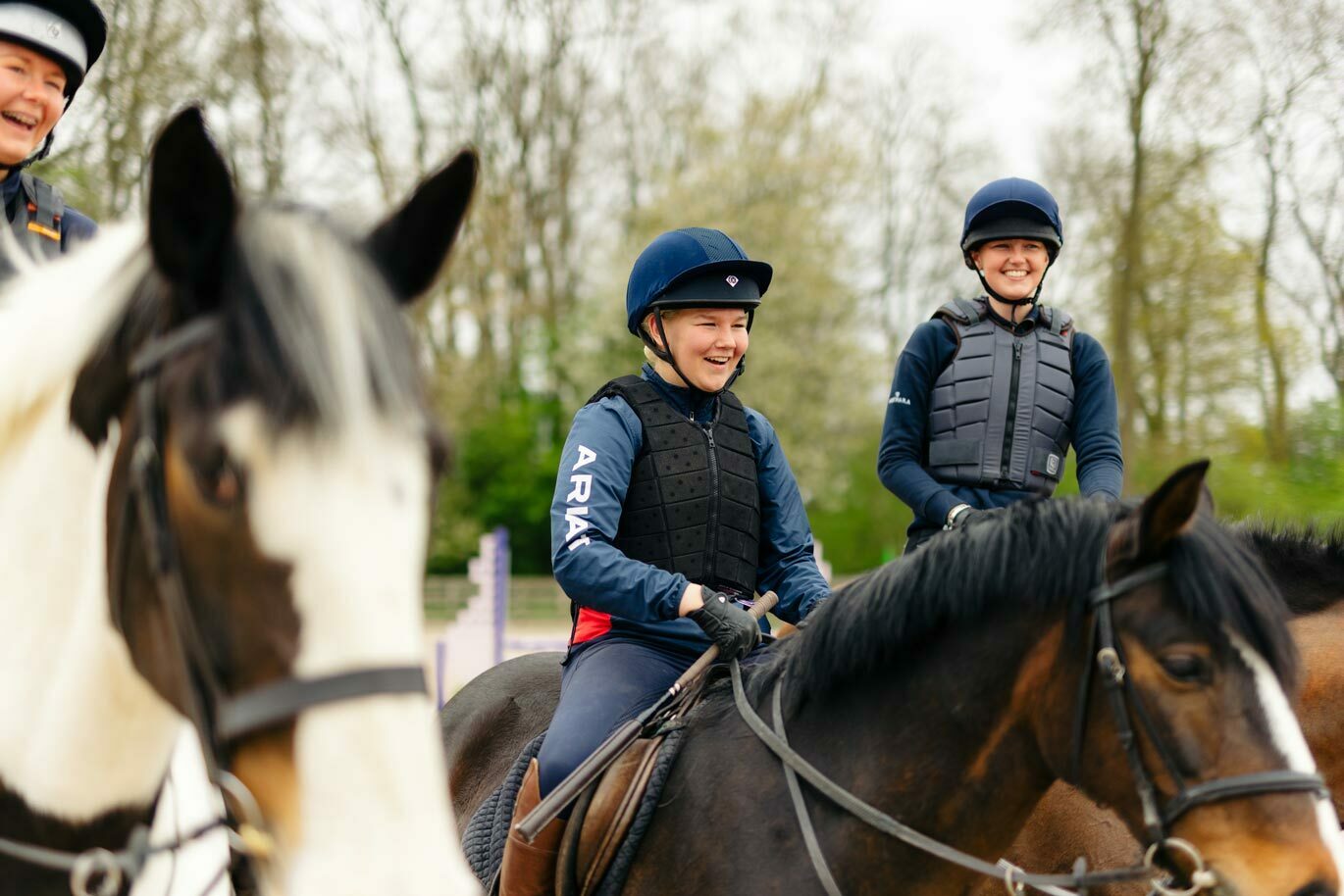 Equine gallery Students on horseback laughing