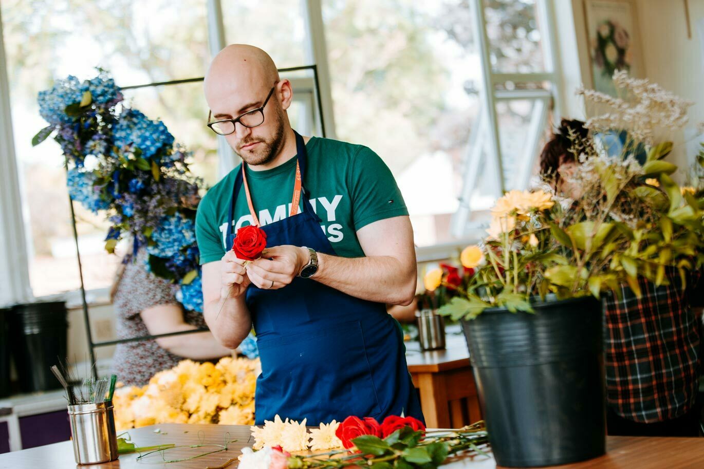 Florsitry gallery Floristry student pruning rose