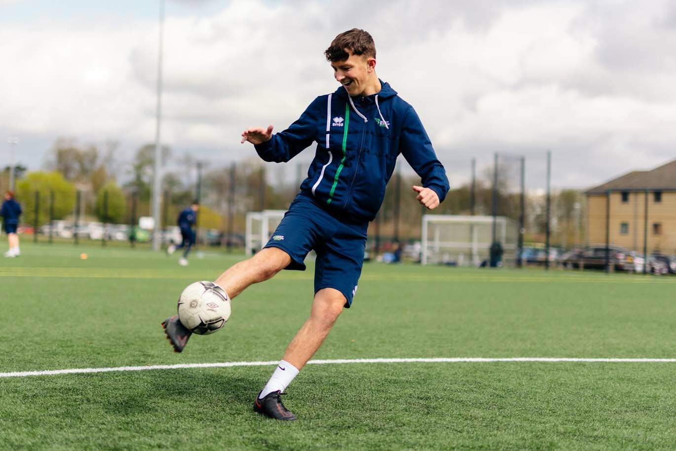 Football academy player training on 3 G pitch