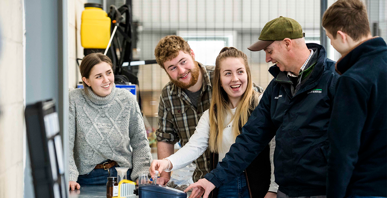 Io T students mixed group in the workshop