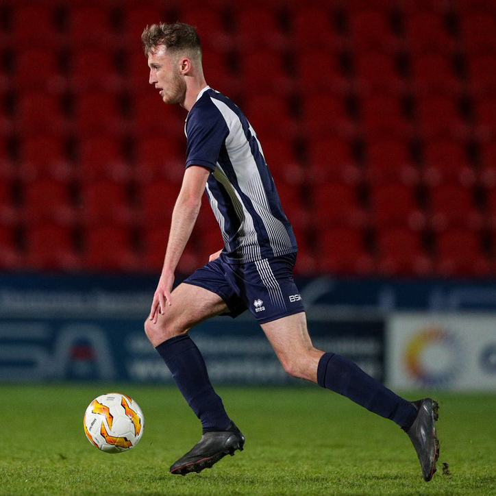 Stu pro Football academy player Matthew Stanford on the pitch