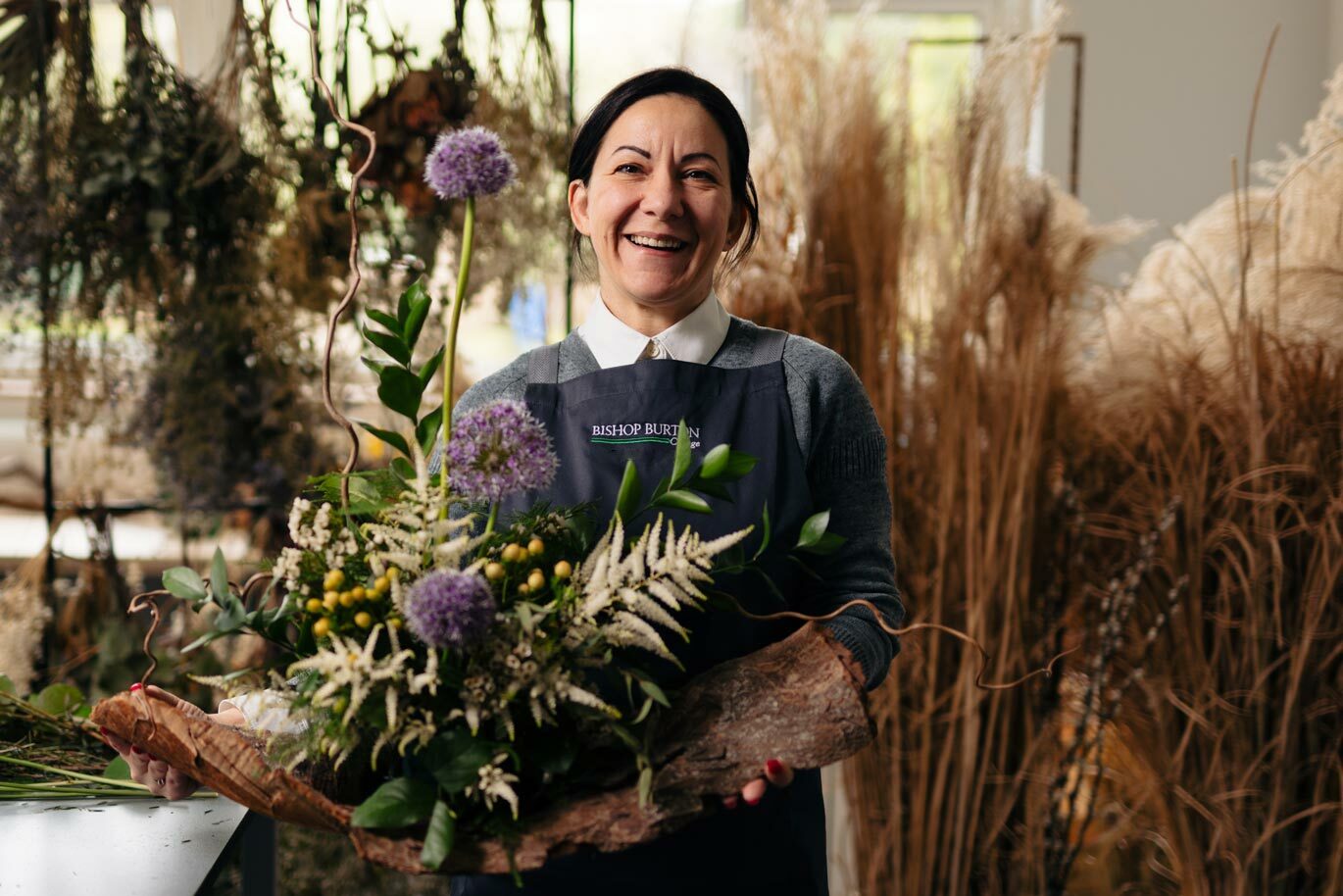 Student on Floristry course holds stunning bouquet