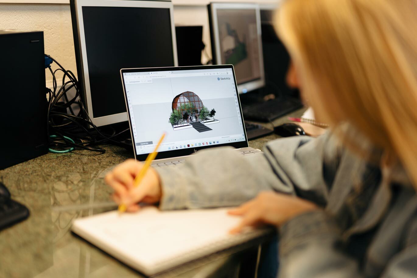 Student working on 3 D design