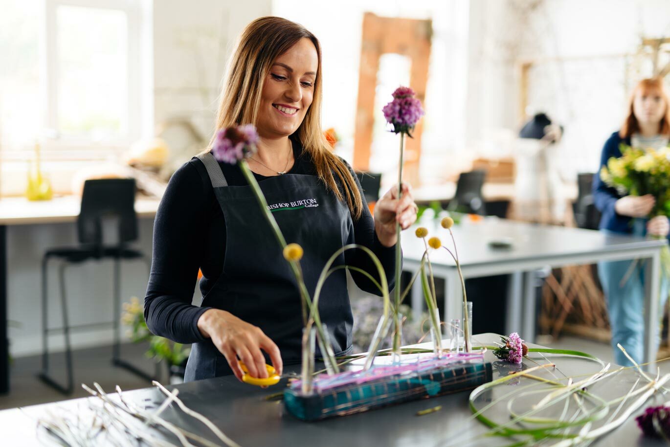 Student working on display in Floristry studio
