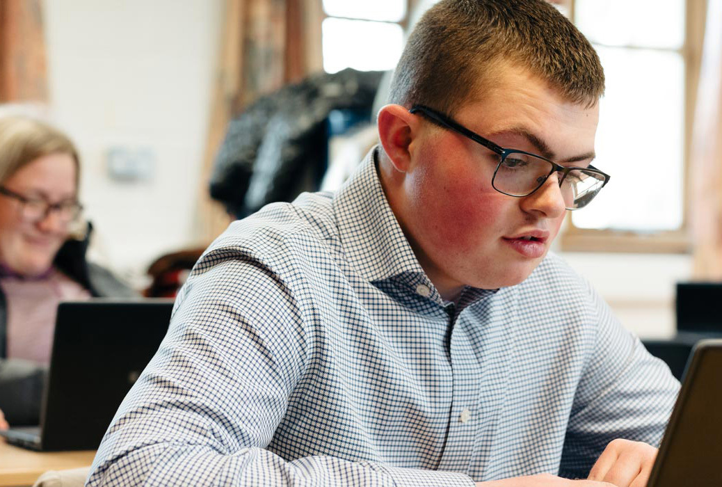 Students in classroom receiving study support