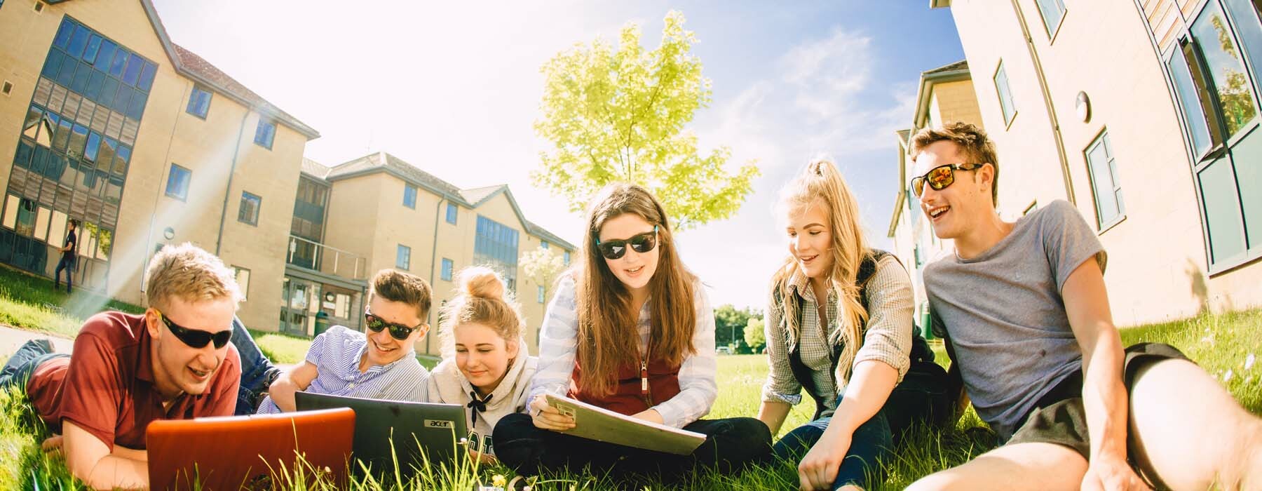 L Live on campus banner Students socialise outside accommodation at University Centre Bishop Burton